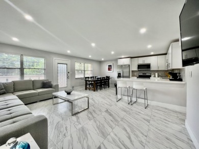 WELCOME HOME TO YOUR 2/2 TURNKEY, COMPLETELY RENOVATED on Wynmoor Golf Course in Florida - for sale on GolfHomes.com, golf home, golf lot
