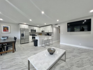 WELCOME HOME TO YOUR 2/2 TURNKEY, COMPLETELY RENOVATED on Wynmoor Golf Course in Florida - for sale on GolfHomes.com, golf home, golf lot