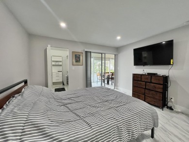 WELCOME HOME TO YOUR 2/2 TURNKEY, COMPLETELY RENOVATED on Wynmoor Golf Course in Florida - for sale on GolfHomes.com, golf home, golf lot