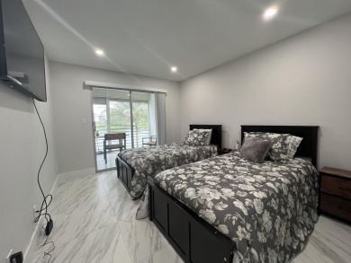 WELCOME HOME TO YOUR 2/2 TURNKEY, COMPLETELY RENOVATED on Wynmoor Golf Course in Florida - for sale on GolfHomes.com, golf home, golf lot