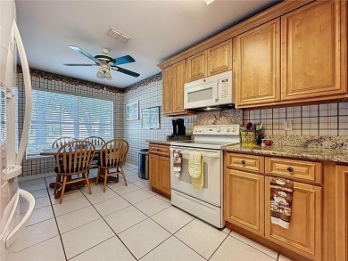 This Crown model is priced to sell. Home is being sold furnished on Kings Ridge Golf Club in Florida - for sale on GolfHomes.com, golf home, golf lot