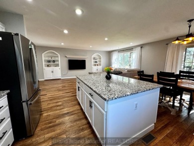 This charming home sits on a large lot with mature trees on the on Indianhead Golf Club in Nebraska - for sale on GolfHomes.com, golf home, golf lot