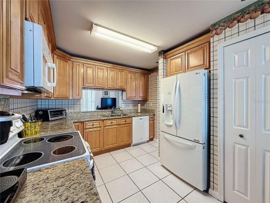 This Crown model is priced to sell. Home is being sold furnished on Kings Ridge Golf Club in Florida - for sale on GolfHomes.com, golf home, golf lot