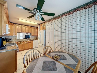 This Crown model is priced to sell. Home is being sold furnished on Kings Ridge Golf Club in Florida - for sale on GolfHomes.com, golf home, golf lot