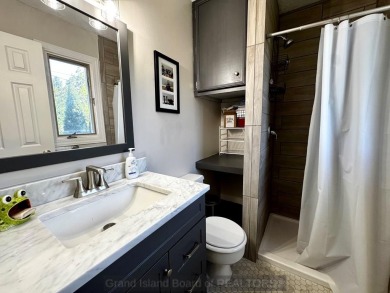 This charming home sits on a large lot with mature trees on the on Indianhead Golf Club in Nebraska - for sale on GolfHomes.com, golf home, golf lot