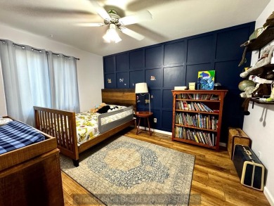 This charming home sits on a large lot with mature trees on the on Indianhead Golf Club in Nebraska - for sale on GolfHomes.com, golf home, golf lot