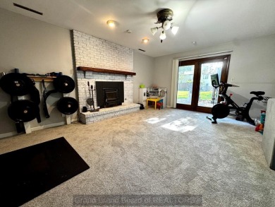 This charming home sits on a large lot with mature trees on the on Indianhead Golf Club in Nebraska - for sale on GolfHomes.com, golf home, golf lot