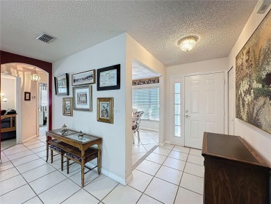 This Crown model is priced to sell. Home is being sold furnished on Kings Ridge Golf Club in Florida - for sale on GolfHomes.com, golf home, golf lot