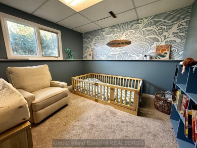 This charming home sits on a large lot with mature trees on the on Indianhead Golf Club in Nebraska - for sale on GolfHomes.com, golf home, golf lot