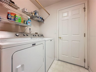 This Crown model is priced to sell. Home is being sold furnished on Kings Ridge Golf Club in Florida - for sale on GolfHomes.com, golf home, golf lot