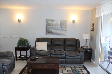 Dont miss this stunning 55+ community property, remodeled on Sunrise Lakes Phase IV Golf Course in Florida - for sale on GolfHomes.com, golf home, golf lot