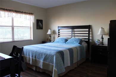 Dont miss this stunning 55+ community property, remodeled on Sunrise Lakes Phase IV Golf Course in Florida - for sale on GolfHomes.com, golf home, golf lot