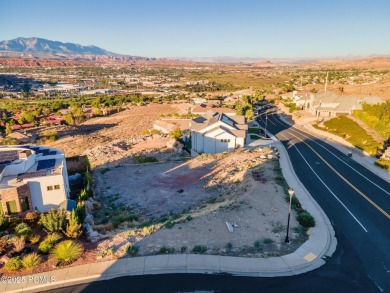 LOT WITH IT ALL: MOUNTAIN, CITY & GOLF COURSE VIEWS! This is on Entrada at Snow Canyon in Utah - for sale on GolfHomes.com, golf home, golf lot