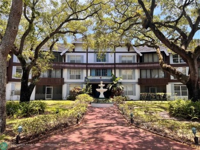Come home to a truly unique one-bedroom end unit with stunning on Inverrary Country Club in Florida - for sale on GolfHomes.com, golf home, golf lot