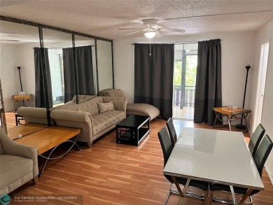 Come home to a truly unique one-bedroom end unit with stunning on Inverrary Country Club in Florida - for sale on GolfHomes.com, golf home, golf lot