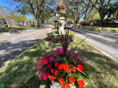 Come home to a truly unique one-bedroom end unit with stunning on Inverrary Country Club in Florida - for sale on GolfHomes.com, golf home, golf lot