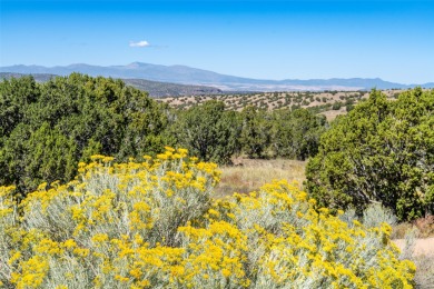 The view says it all. This truly exceptional lot in the on The Club At Las Campanas  in New Mexico - for sale on GolfHomes.com, golf home, golf lot