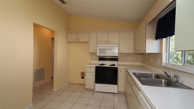 Whoa!  Here is the perfect chance to live in a gated 55+ on The Links of Spruce Creek in Florida - for sale on GolfHomes.com, golf home, golf lot