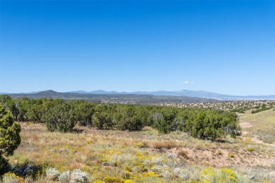 The view says it all. This truly exceptional lot in the on The Club At Las Campanas  in New Mexico - for sale on GolfHomes.com, golf home, golf lot