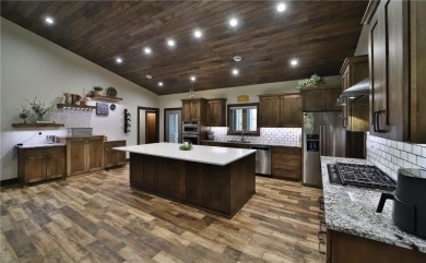 Don't miss this three-bedroom, four-bath custom-built home. Home on Blueberry Pines Golf CLub in Minnesota - for sale on GolfHomes.com, golf home, golf lot
