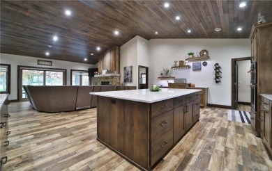 Don't miss this three-bedroom, four-bath custom-built home. Home on Blueberry Pines Golf CLub in Minnesota - for sale on GolfHomes.com, golf home, golf lot