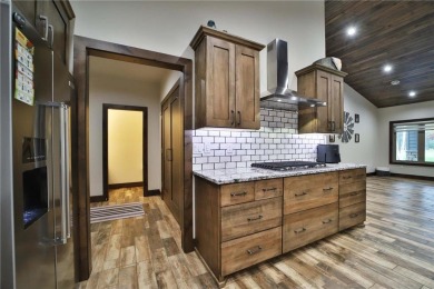 Don't miss this three-bedroom, four-bath custom-built home. Home on Blueberry Pines Golf CLub in Minnesota - for sale on GolfHomes.com, golf home, golf lot