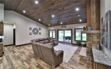 Don't miss this three-bedroom, four-bath custom-built home. Home on Blueberry Pines Golf CLub in Minnesota - for sale on GolfHomes.com, golf home, golf lot