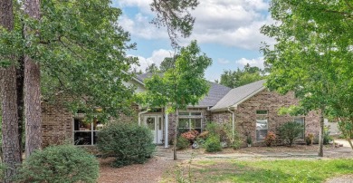 This nice brick three bedroom, 2 1/2 baths, 2 car garage - home on Ponce De Leon Golf Course in Arkansas - for sale on GolfHomes.com, golf home, golf lot