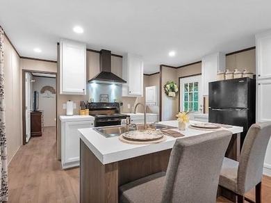 Nestled among the pines, this charming 2-bedroom, 2-bath turnkey on Rayburn Country Club in Texas - for sale on GolfHomes.com, golf home, golf lot