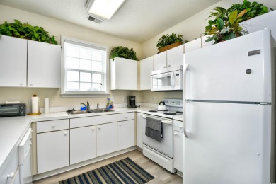 You will love this beautiful top floor end unit offering 2 on Barefoot Resort and Golf Club  in South Carolina - for sale on GolfHomes.com, golf home, golf lot