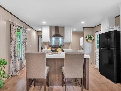 Nestled among the pines, this charming 2-bedroom, 2-bath turnkey on Rayburn Country Club in Texas - for sale on GolfHomes.com, golf home, golf lot