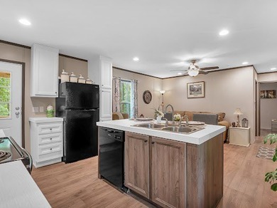 Nestled among the pines, this charming 2-bedroom, 2-bath turnkey on Rayburn Country Club in Texas - for sale on GolfHomes.com, golf home, golf lot