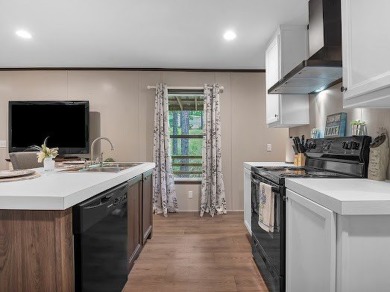 Nestled among the pines, this charming 2-bedroom, 2-bath turnkey on Rayburn Country Club in Texas - for sale on GolfHomes.com, golf home, golf lot