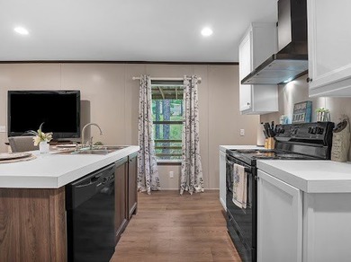 Nestled among the pines, this charming 2-bedroom, 2-bath turnkey on Rayburn Country Club in Texas - for sale on GolfHomes.com, golf home, golf lot