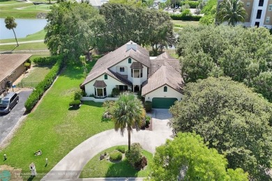 Distinctively Designed Total Custom 5 bedrooms, 3.5 Bath located on Country Club of Coral Springs in Florida - for sale on GolfHomes.com, golf home, golf lot