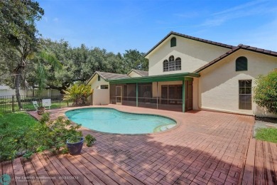 Distinctively Designed Total Custom 5 bedrooms, 3.5 Bath located on Country Club of Coral Springs in Florida - for sale on GolfHomes.com, golf home, golf lot