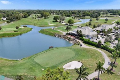 Distinctively Designed Total Custom 5 bedrooms, 3.5 Bath located on Country Club of Coral Springs in Florida - for sale on GolfHomes.com, golf home, golf lot