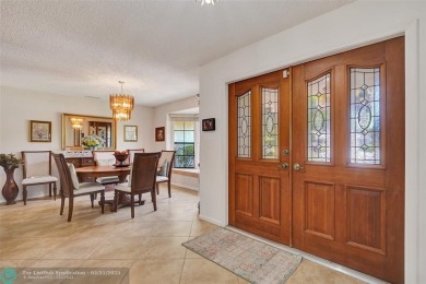 Distinctively Designed Total Custom 5 bedrooms, 3.5 Bath located on Country Club of Coral Springs in Florida - for sale on GolfHomes.com, golf home, golf lot