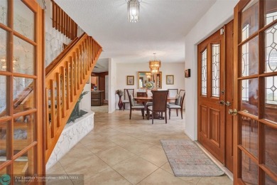 Distinctively Designed Total Custom 5 bedrooms, 3.5 Bath located on Country Club of Coral Springs in Florida - for sale on GolfHomes.com, golf home, golf lot