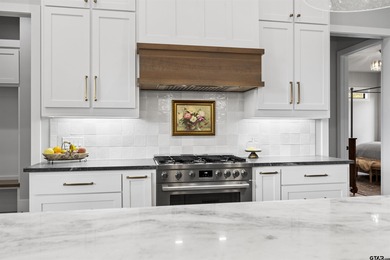 Exquisite luxury living in Hideaway, Tx. This immaculate home is on Hide-A-Way Lake Golf Course in Texas - for sale on GolfHomes.com, golf home, golf lot