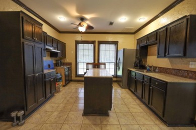 Look at this stunning home on Bayou Desiard in Frenchmen's Bend on Frenchmans Bend Country Club in Louisiana - for sale on GolfHomes.com, golf home, golf lot