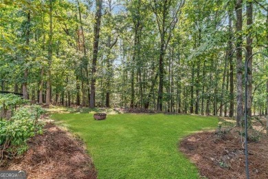 Welcome to 576 Fairway Drive, located in the highly sought-after on Canongate At Eagle Watch Golf Club in Georgia - for sale on GolfHomes.com, golf home, golf lot