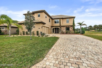 Gorgeous grand entrance through your foyer to the Great Room on Plantation Bay Golf and Country Club in Florida - for sale on GolfHomes.com, golf home, golf lot