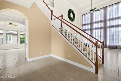 Gorgeous grand entrance through your foyer to the Great Room on Plantation Bay Golf and Country Club in Florida - for sale on GolfHomes.com, golf home, golf lot