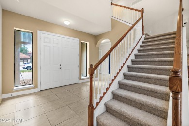 Gorgeous grand entrance through your foyer to the Great Room on Plantation Bay Golf and Country Club in Florida - for sale on GolfHomes.com, golf home, golf lot