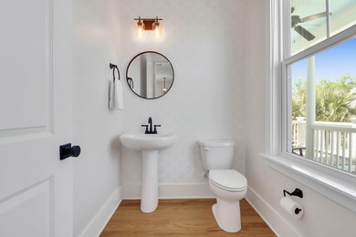 Enjoy coastal living in this better-than-new home on a private on Charleston National Golf Club in South Carolina - for sale on GolfHomes.com, golf home, golf lot