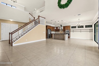 Gorgeous grand entrance through your foyer to the Great Room on Plantation Bay Golf and Country Club in Florida - for sale on GolfHomes.com, golf home, golf lot