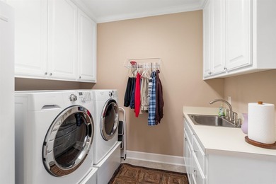 This all-brick, custom-built home sits on a level lot on on Granada Golf Course in Arkansas - for sale on GolfHomes.com, golf home, golf lot