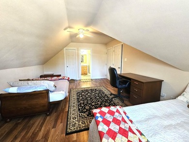 This all-brick, custom-built home sits on a level lot on on Granada Golf Course in Arkansas - for sale on GolfHomes.com, golf home, golf lot