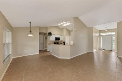 Ready for a quick closing! Stunning 4-bedroom home located on a on Deep Creek Golf Club in Florida - for sale on GolfHomes.com, golf home, golf lot